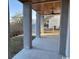 Back porch with wood ceiling and concrete columns at 172 Enclave Pl., Pawleys Island, SC 29585