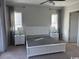 A spacious bedroom featuring a king bed, night stands, and lamps at 172 Enclave Pl., Pawleys Island, SC 29585