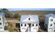 Exterior of home with a metal roof and marsh views in distance at 172 Enclave Pl., Pawleys Island, SC 29585