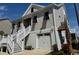 Charming coastal home with an elevated stairway and single-car garage at 172 Enclave Pl., Pawleys Island, SC 29585