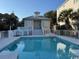 Exterior pool area with bath house at 172 Enclave Pl., Pawleys Island, SC 29585