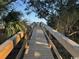 Wooden walkway leading to the beach at 172 Enclave Pl., Pawleys Island, SC 29585