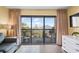 Balcony view from the living room offers lots of natural light and outside space to relax at 210 75Th Ave N # 4032, Myrtle Beach, SC 29572