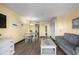 Living room with dining area, sofa and TV offer a nice place to relax at 210 75Th Ave N # 4032, Myrtle Beach, SC 29572