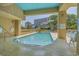 Outdoor swimming pool with chairs, lush landscaping and a beautiful view at 210 75Th Ave N # 4032, Myrtle Beach, SC 29572