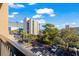 Balcony view of the parking area with the skyline and beach in the background at 210 75Th Ave N # 4033, Myrtle Beach, SC 29572