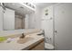 Clean bathroom featuring a large mirror, toilet, and neutral tiling at 210 75Th Ave N # 4033, Myrtle Beach, SC 29572