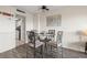 Charming dining area with a glass table, comfortable seating, and adjacent kitchen, ideal for cozy meals and gatherings at 210 75Th Ave N # 4033, Myrtle Beach, SC 29572