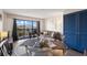 Bright living room featuring a glass-top dining table and balcony access with views at 210 75Th Ave N # 4033, Myrtle Beach, SC 29572