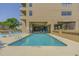 Community pool with lounge chairs for relaxing at 210 75Th Ave N # 4033, Myrtle Beach, SC 29572
