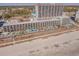 An elevated view of the beachfront resort and its multiple outdoor pools at 2301 S Ocean Blvd. # 825, Myrtle Beach, SC 29577
