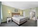 Inviting bedroom features a spacious king-size bed, cozy bedside lamps, and a convenient doorway at 2301 S Ocean Blvd. # 825, Myrtle Beach, SC 29577