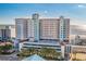 Beautiful exterior of multi-story oceanfront resort highlighting the building's architecture, parking garage, and ocean views at 2301 S Ocean Blvd. # 825, Myrtle Beach, SC 29577