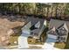 An aerial view of a house with a well-manicured front lawn and a concrete driveway at 2449 Campton Loop, Conway, SC 29527