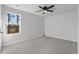 Empty bedroom featuring neutral colors, a ceiling fan, carpet and a window at 2449 Campton Loop, Conway, SC 29527
