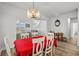 Bright dining area featuring a modern chandelier and neutral paint colors at 2449 Campton Loop, Conway, SC 29527