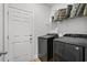 A conveniently located laundry room with modern washer and dryer units at 2449 Campton Loop, Conway, SC 29527