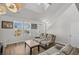 Bright living room with modern furniture and plenty of natural light at 2449 Campton Loop, Conway, SC 29527