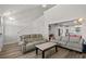 Bright living room with modern furniture and open floorplan at 2449 Campton Loop, Conway, SC 29527
