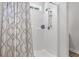 Close-up of the clean shower with a decorative curtain at 2449 Campton Loop, Conway, SC 29527