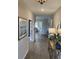 Inviting hallway with wood floors leading to living spaces, enhanced by natural light and stylish decor at 2501 Brescia St., Myrtle Beach, SC 29579