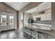 Well-equipped community kitchen with granite counters, modern appliances, and bar seating at 2501 Brescia St., Myrtle Beach, SC 29579