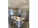 Beautiful kitchen featuring a large center island with bar seating and stainless steel appliances, and pendant lights at 2501 Brescia St., Myrtle Beach, SC 29579
