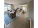 Open-concept with dining area and living room, featuring ample natural light and stylish furnishings at 2501 Brescia St., Myrtle Beach, SC 29579
