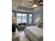 Serene main bedroom featuring large windows with pond views and a comfortable seating area at 2501 Brescia St., Myrtle Beach, SC 29579