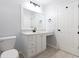 Bathroom featuring a vanity with quartz countertop, tile flooring, and black hardware at 260 Barclay Dr., Myrtle Beach, SC 29579
