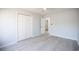Light-filled bedroom with ceiling fan, modern floors and closet at 260 Barclay Dr., Myrtle Beach, SC 29579
