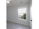 Bedroom filled with natural light features a ceiling fan and wood-look floors at 260 Barclay Dr., Myrtle Beach, SC 29579