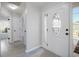 Inviting foyer with decorative front door and sidelight, offers a bright entrance at 260 Barclay Dr., Myrtle Beach, SC 29579