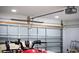 Garage interior view showcasing a modern garage door, lights and hardware at 260 Barclay Dr., Myrtle Beach, SC 29579