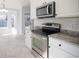 Kitchen features stainless steel appliances, granite countertops and white backsplash at 260 Barclay Dr., Myrtle Beach, SC 29579