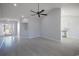 Bright living room with vaulted ceiling, gray floors, open floor plan, and stainless steel appliances at 260 Barclay Dr., Myrtle Beach, SC 29579