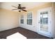 Cozy outdoor patio with a ceiling fan, perfect for entertaining or relaxing at 260 Barclay Dr., Myrtle Beach, SC 29579