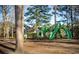 Community playground with green slides and play structures, perfect for families at 260 Barclay Dr., Myrtle Beach, SC 29579