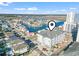 An aerial view of a condo building nestled in a charming waterfront community with picturesque views of the surrounding waterways at 3401 N Ocean Blvd. # 109, North Myrtle Beach, SC 29582