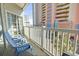 Balcony with seating offers views of the building and beach beyond at 3401 N Ocean Blvd. # 109, North Myrtle Beach, SC 29582