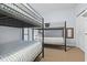 bedroom features bunk beds and closet at 3401 N Ocean Blvd. # 109, North Myrtle Beach, SC 29582