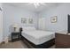 Cozy bedroom with queen bed, and soft blue walls at 3401 N Ocean Blvd. # 109, North Myrtle Beach, SC 29582