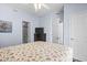 Cozy bedroom with a comfortable bed, television, and adjoining rooms at 3401 N Ocean Blvd. # 109, North Myrtle Beach, SC 29582
