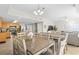 Open dining area with ample seating, tile floors, and easy access to the kitchen and living room at 3401 N Ocean Blvd. # 109, North Myrtle Beach, SC 29582