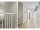 Upstairs hallway with wood flooring at 3401 N Ocean Blvd. # 109, North Myrtle Beach, SC 29582