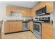 Bright kitchen featuring stainless steel appliances and granite countertops at 3401 N Ocean Blvd. # 109, North Myrtle Beach, SC 29582