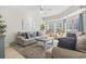 Inviting living room with comfortable sofas, nautical decor, and plenty of natural light at 3401 N Ocean Blvd. # 109, North Myrtle Beach, SC 29582
