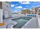 Swimming pool featuring lounge chairs and stairs for accessibility on a beautiful day at 3401 N Ocean Blvd. # 109, North Myrtle Beach, SC 29582