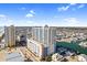 An aerial view showcases a condo building nestled in a coastal community with a beautiful waterfront and ocean views at 3601 N Ocean Blvd. # 1840, North Myrtle Beach, SC 29582