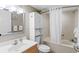 Cozy bathroom featuring a bathtub and shower, vanity, cabinet, and coordinated decor at 3601 N Ocean Blvd. # 1840, North Myrtle Beach, SC 29582